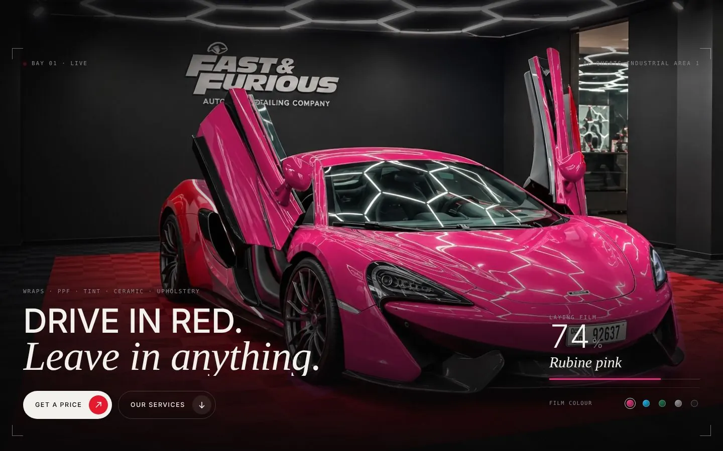 Car wrap studio website on a laptop