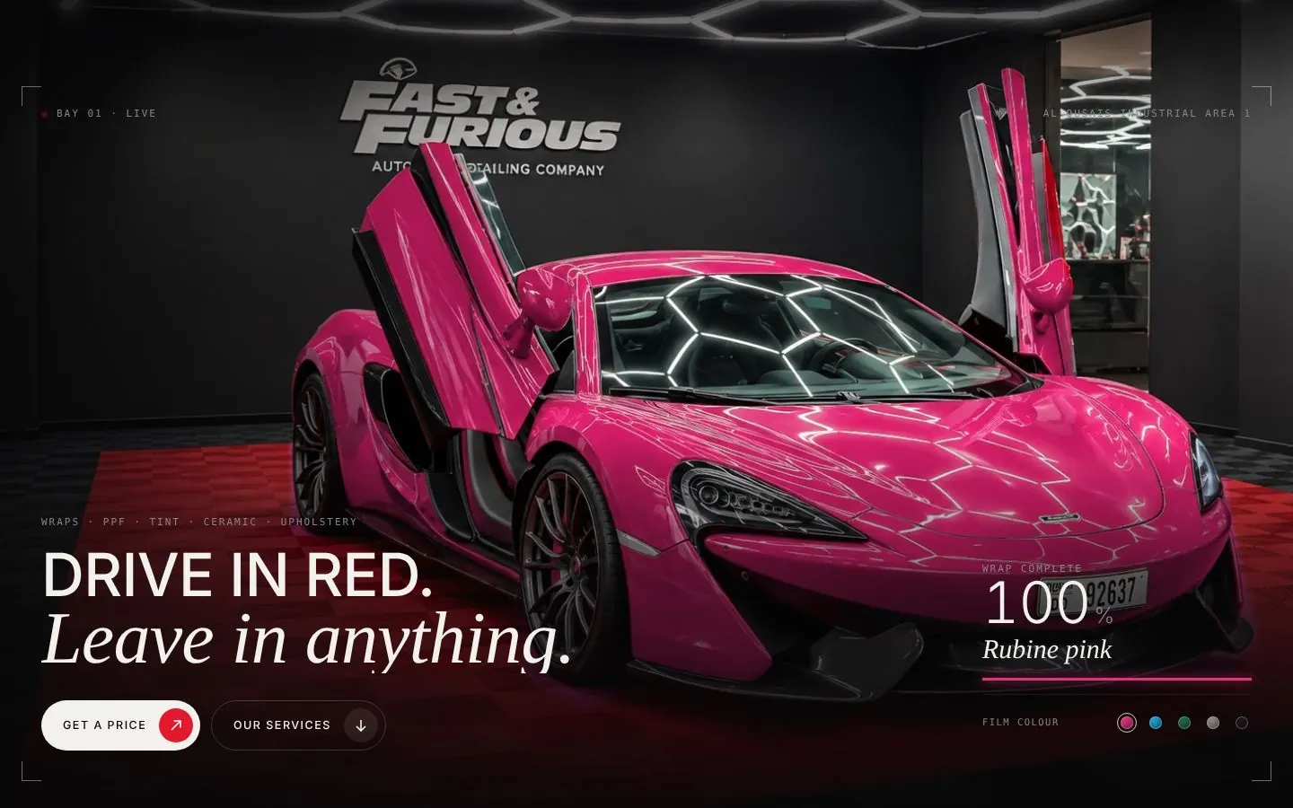 Car wrap studio website with a pink McLaren